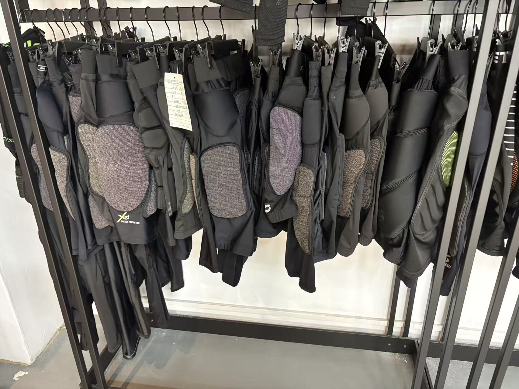 Ski hip protection padded apparel on hangers